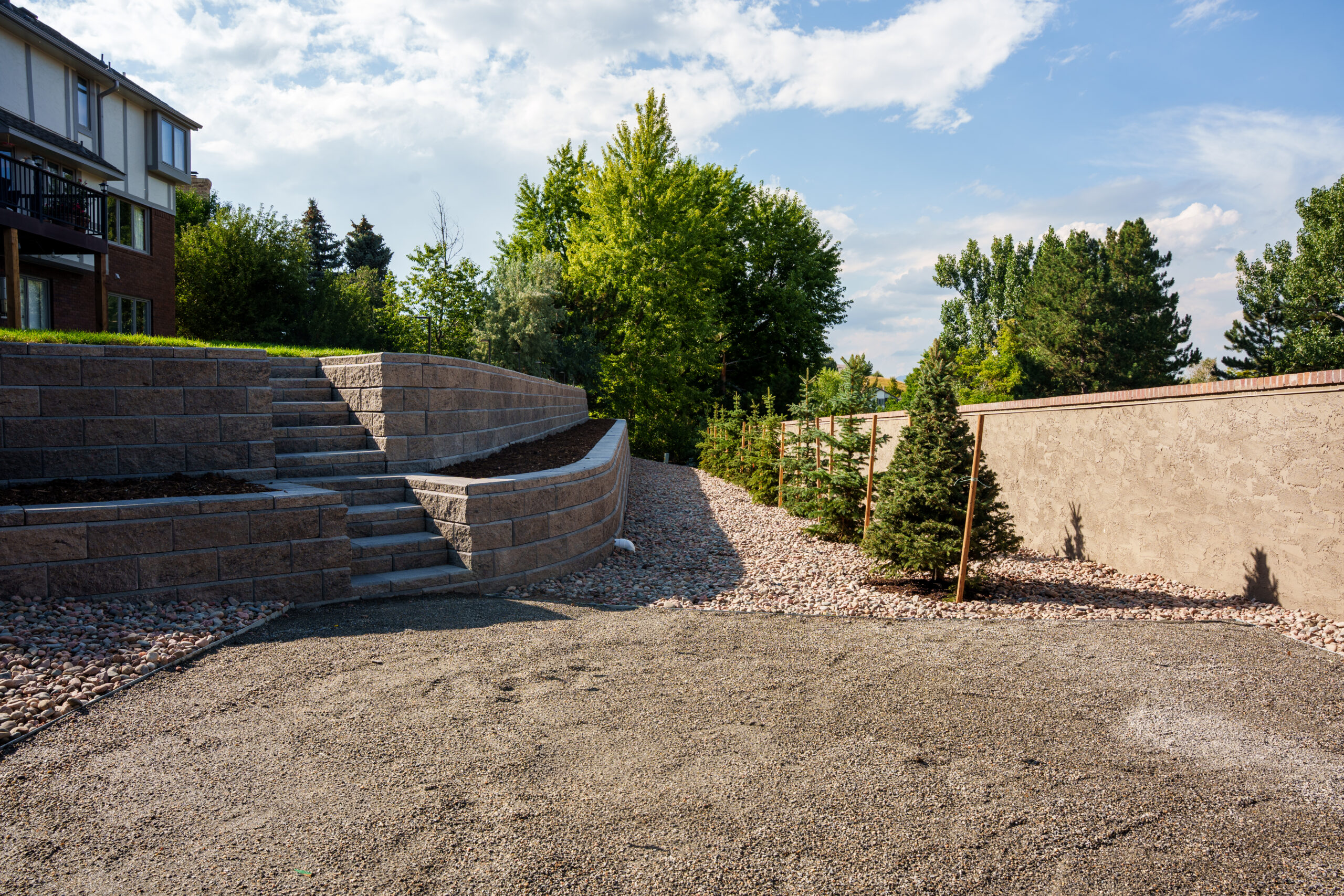 Tiered terrace retaining wall with steps