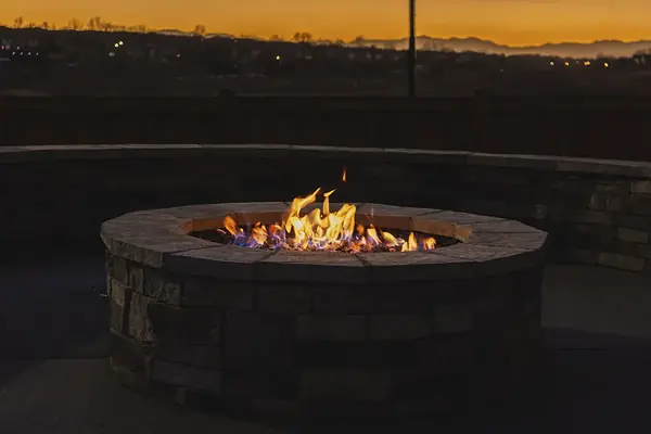 Gas fire pit at dusk