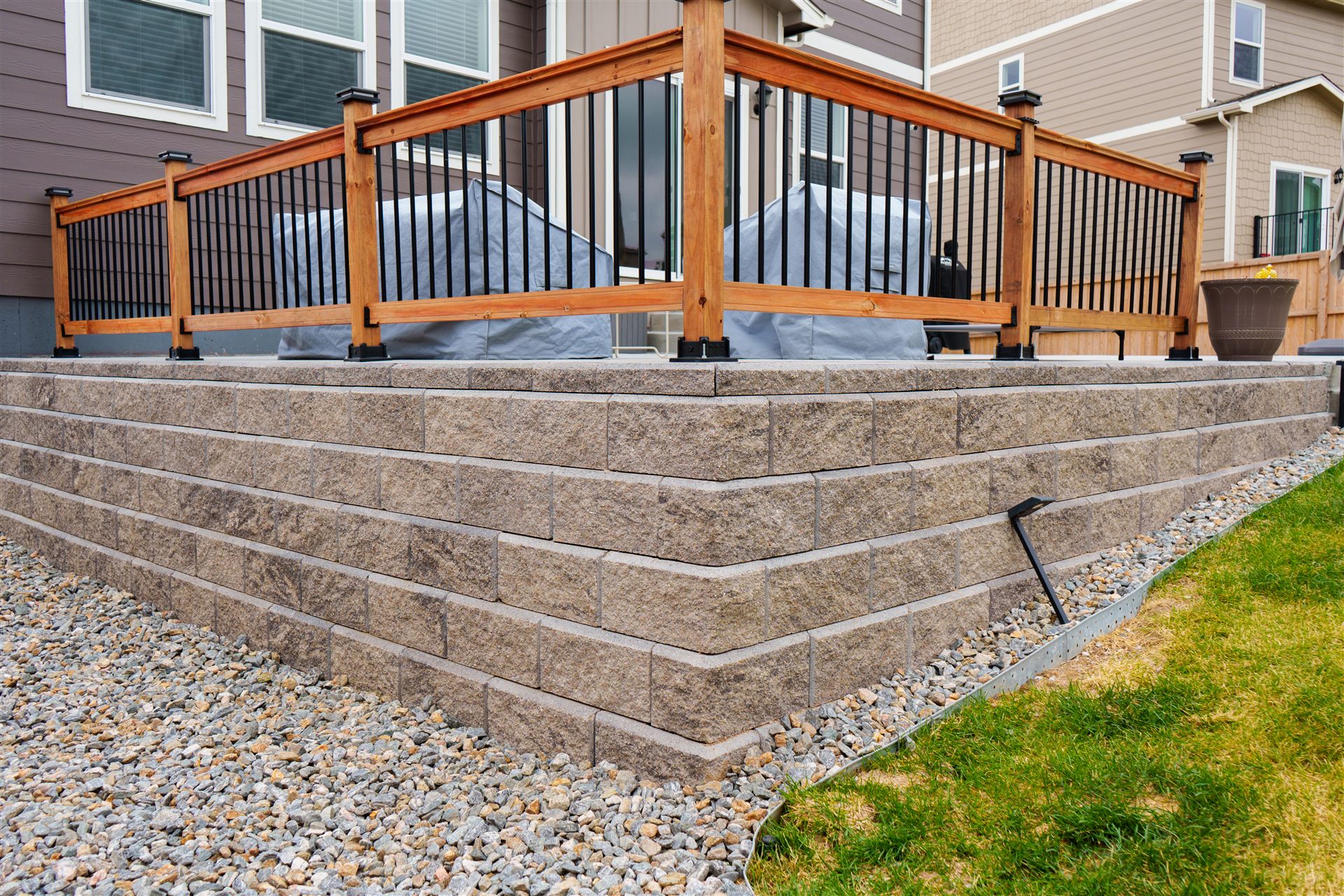 Close-up of a capped block wall and railing