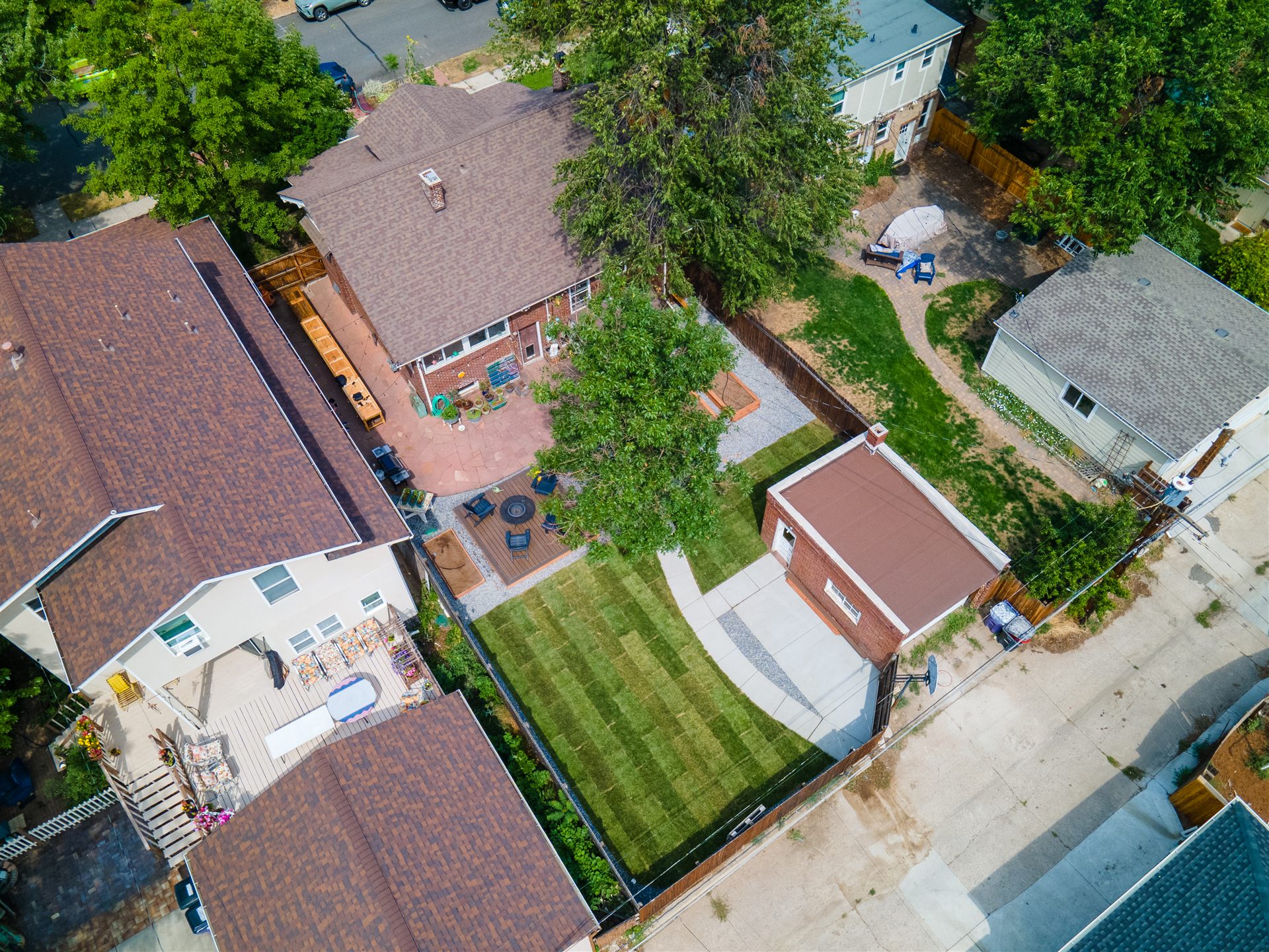Angled aerial view of a backyard with new sod