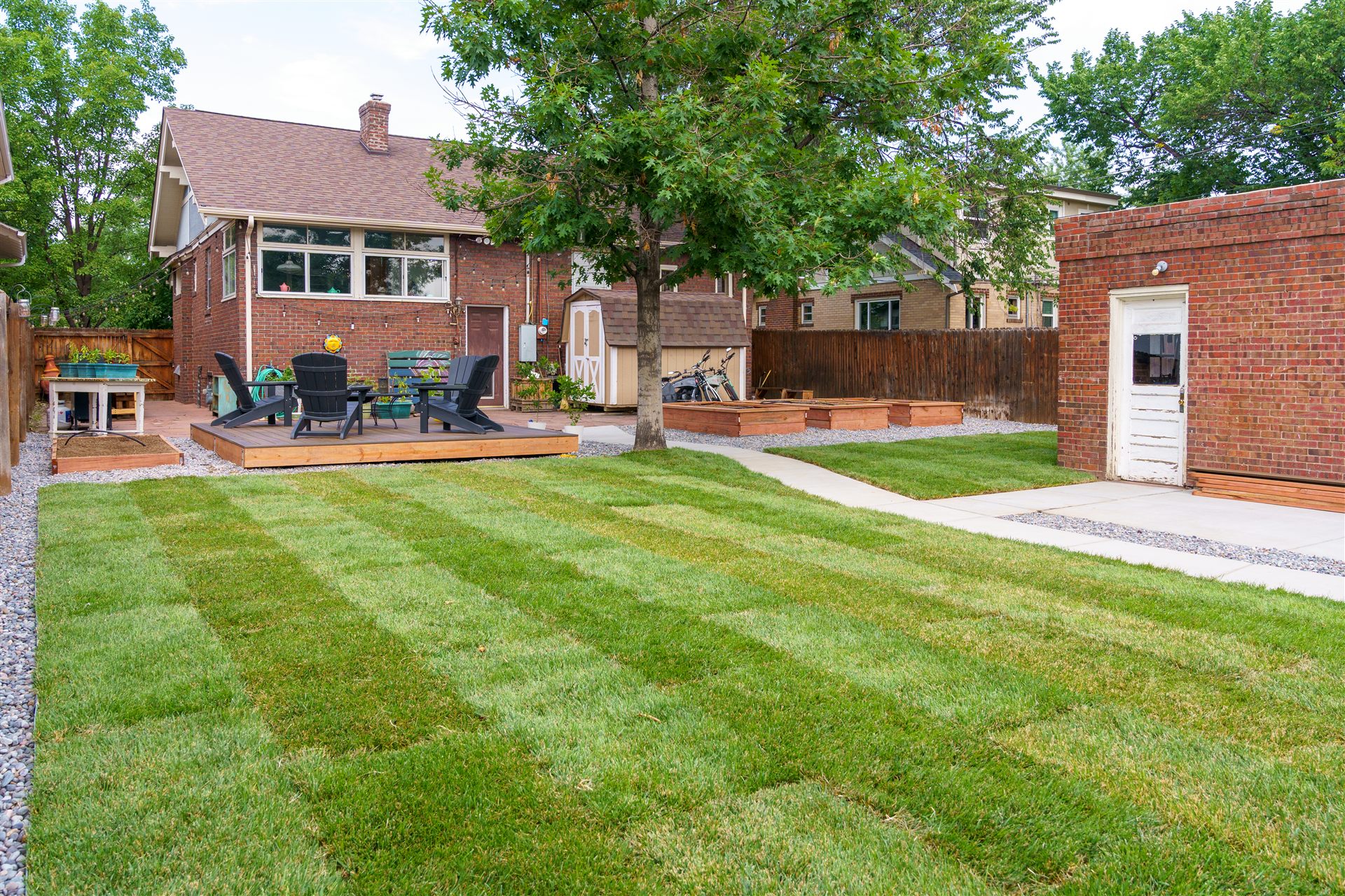 Fresh sod lawn and deck in a Commerce City backyard