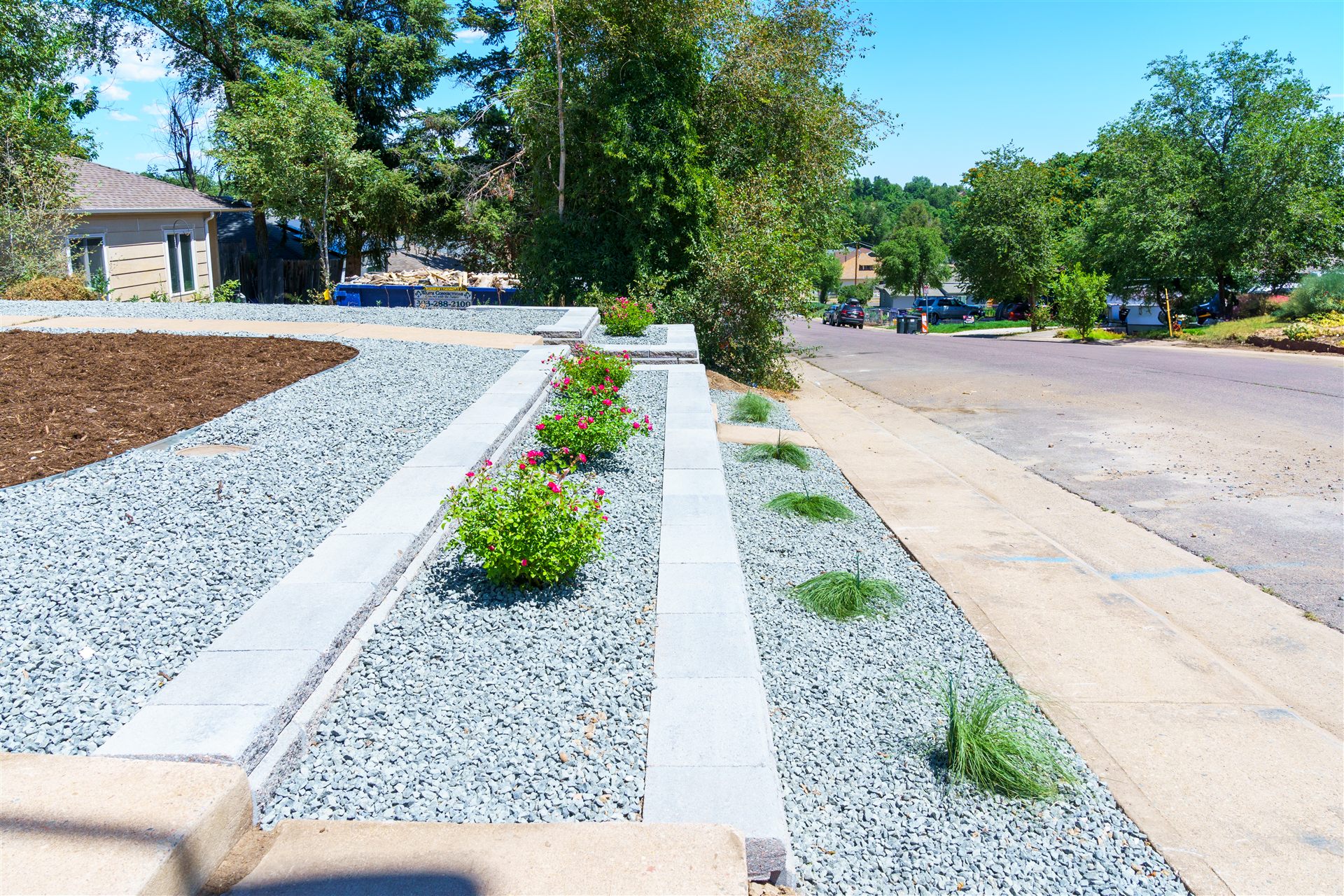 Block wall and planting strip along the sidewalk