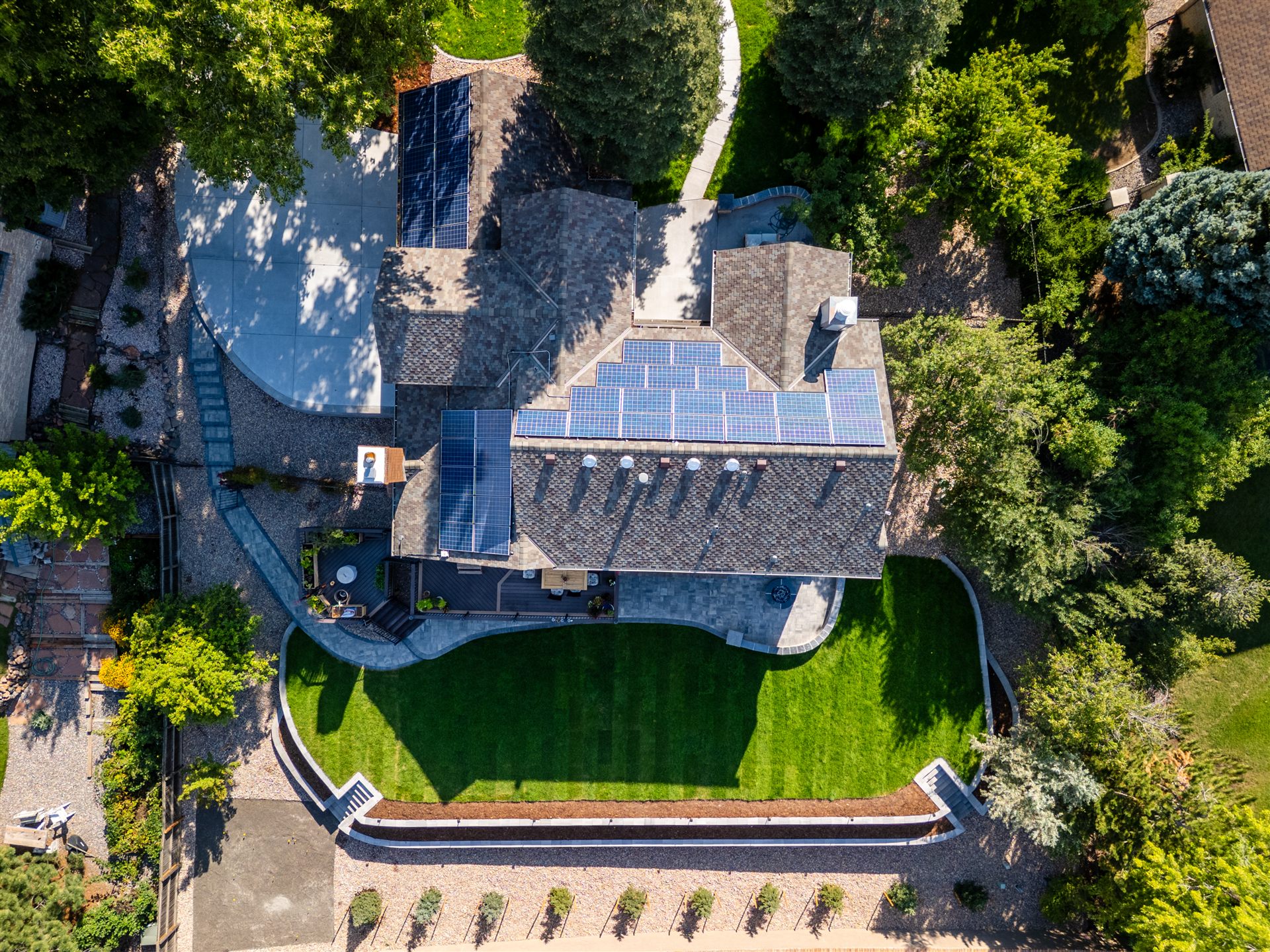 Overhead view of a curved retaining wall along a street