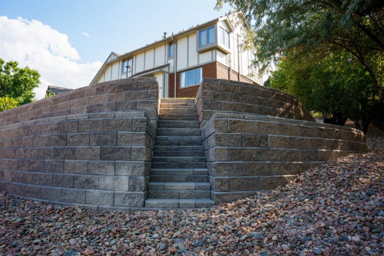 Tiered block retaining walls with block stairs in Littleton, CO